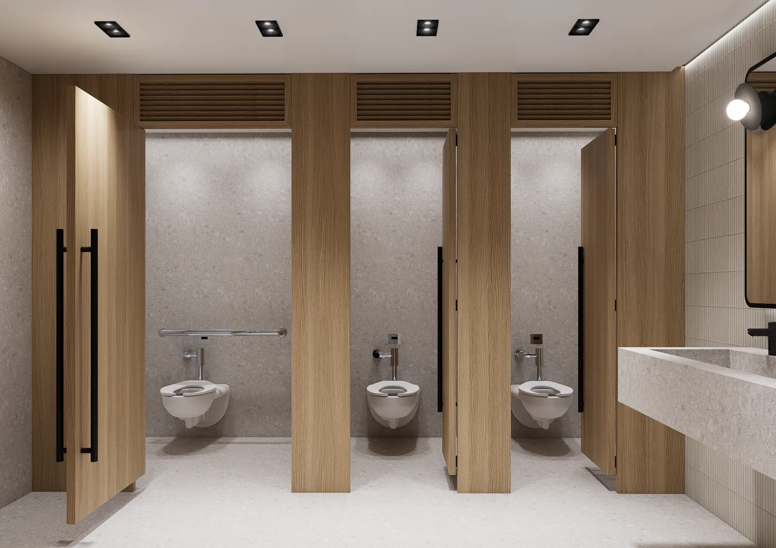 Restroom with floor-to-ceiling oak stall partitions and stone finishes